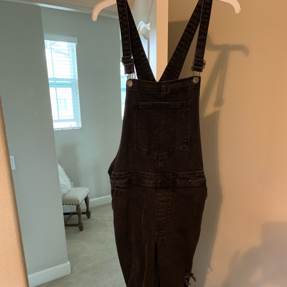 Black distressed and ripped jean overalls size 14